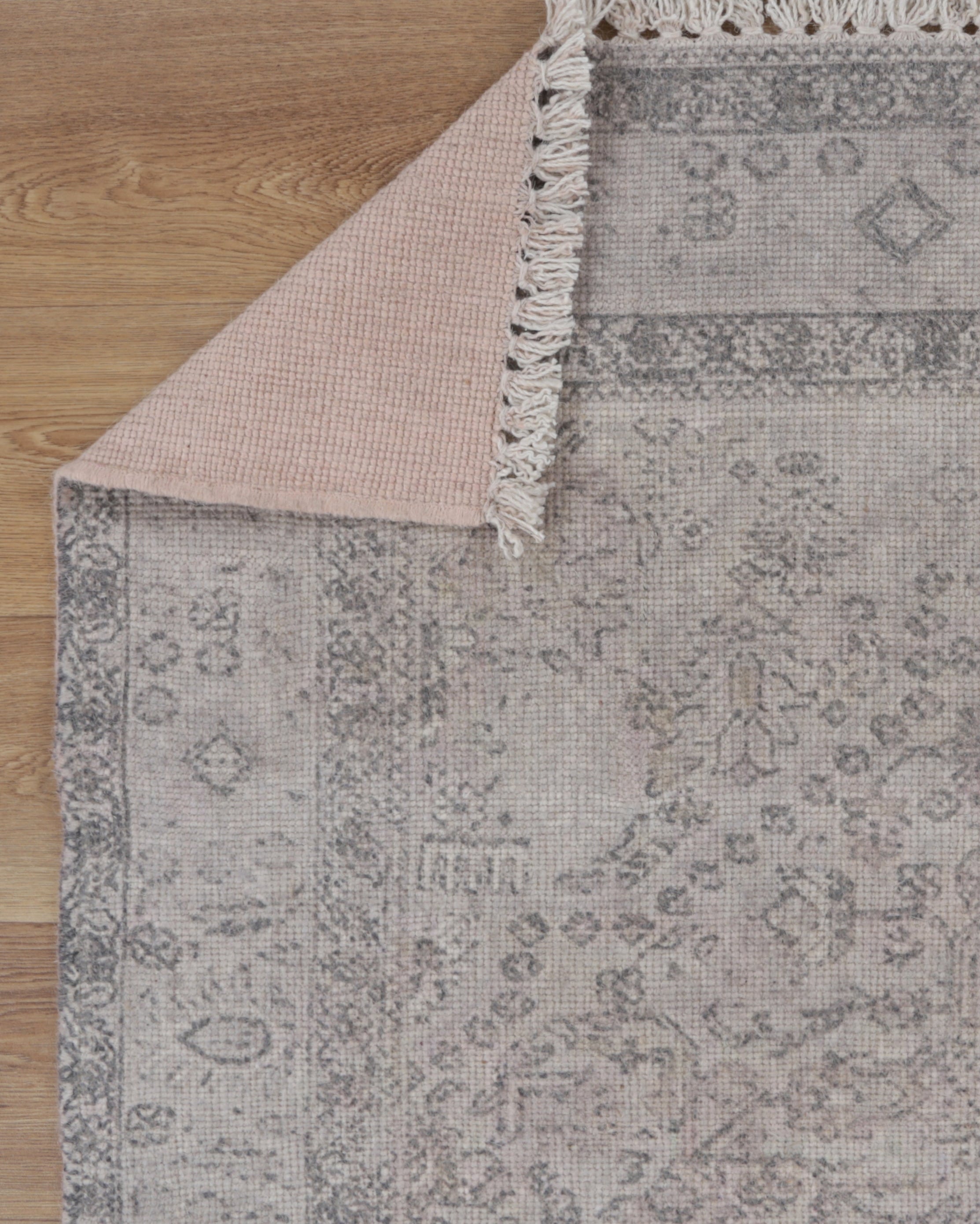 Agora Kasbah Ash Wool Rug folded corner photo