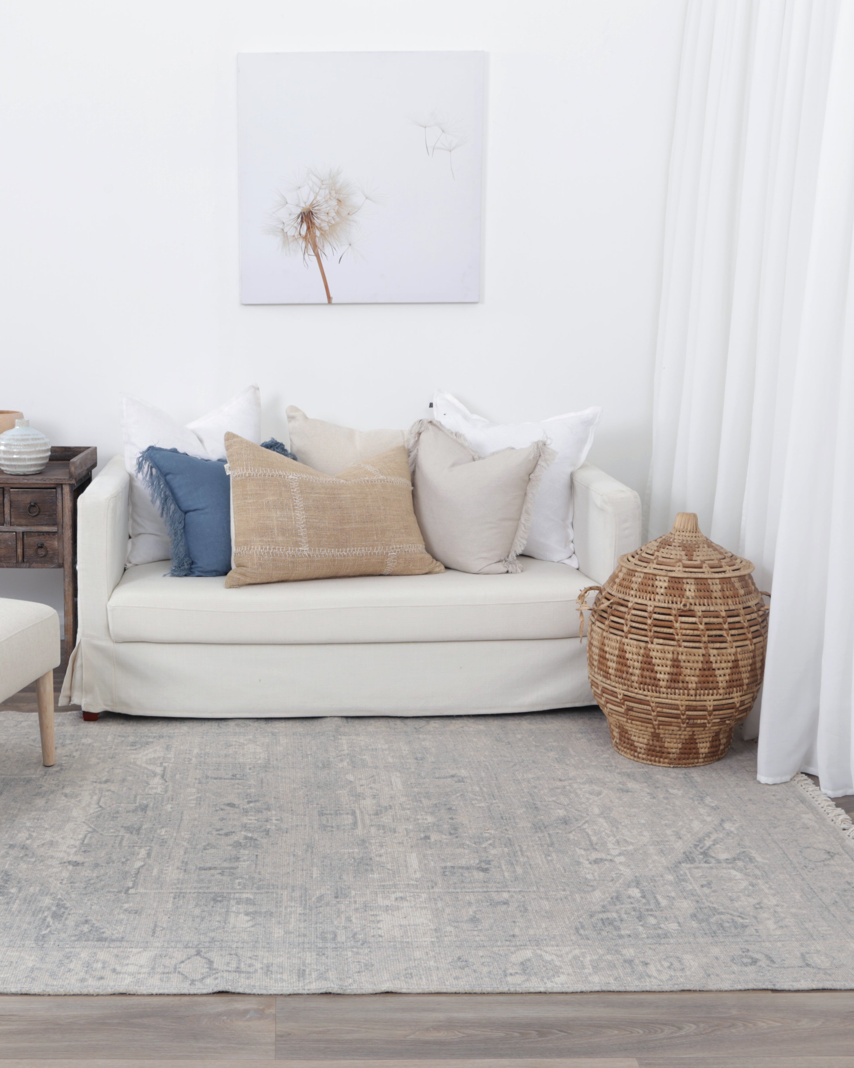 Agora Souk Ivory Wool Rug in living room with furnishings on blonde flooring