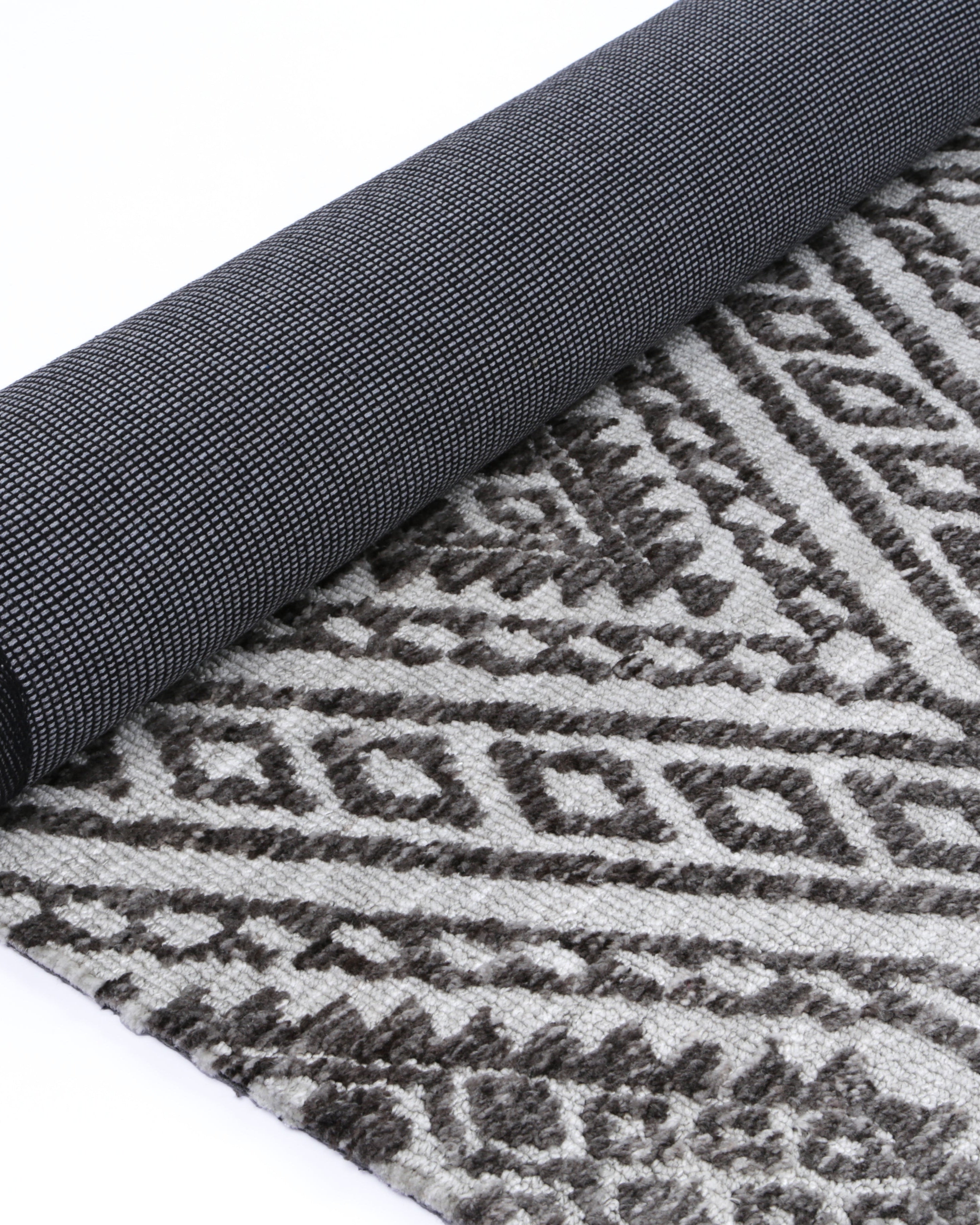 Alayah Zalij silver Rug rolled showing backing