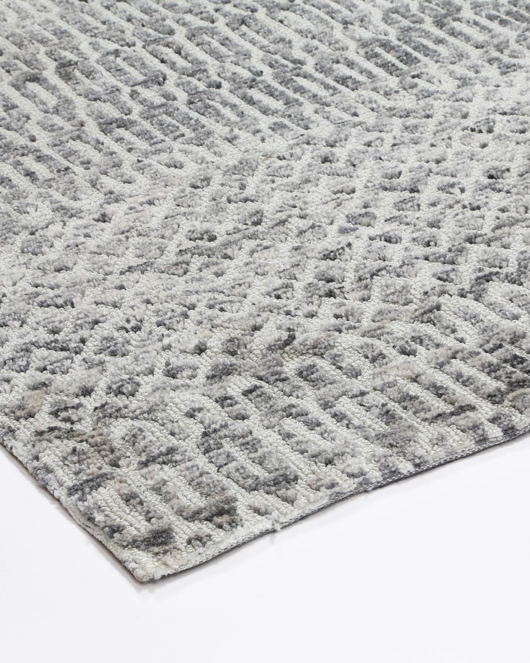 Alayah Camphils Silver Rug corner photo on white background