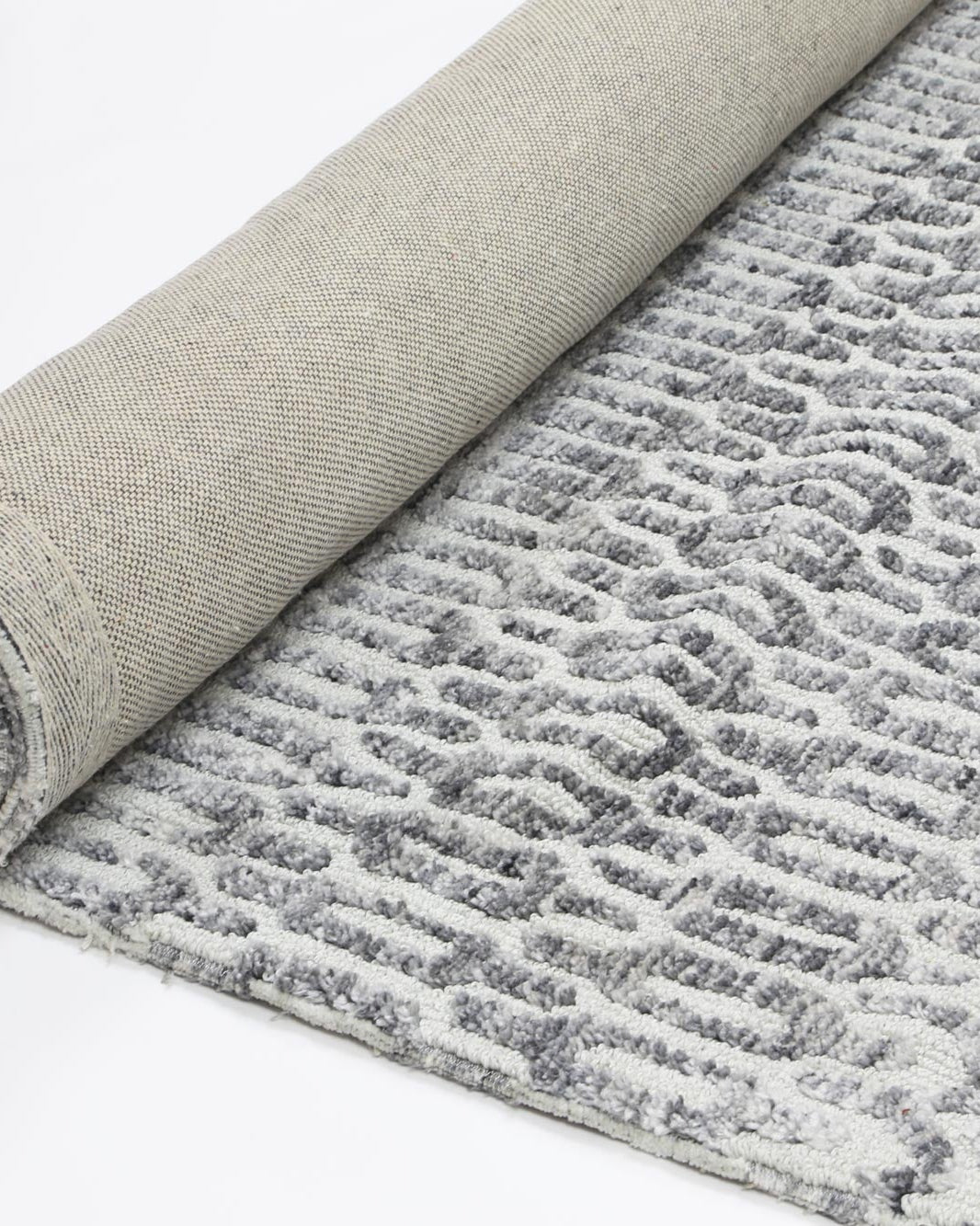 Alayah Camphils Silver Rug rolled photo white background