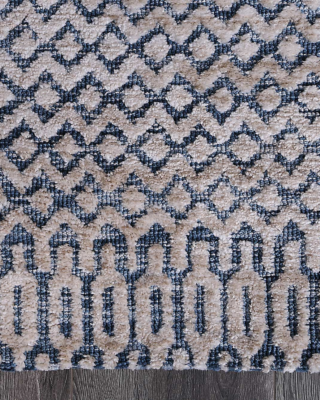 Alayah Camphils Blue Rug corner shot on dark flooring