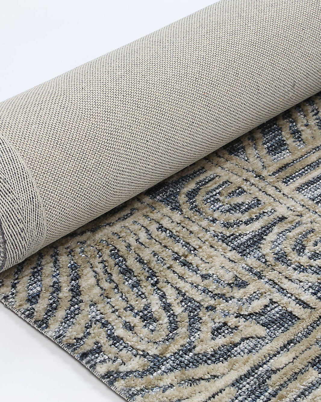 Alayah Charcoal Flower Rug rolled product shot