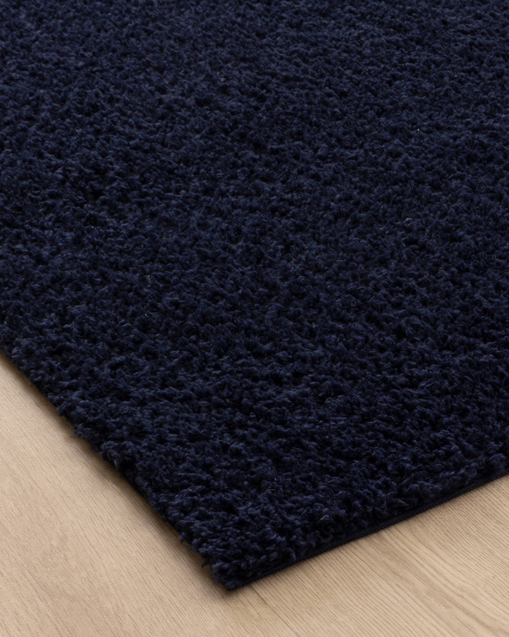 Lune Shaggy Navy Rug.