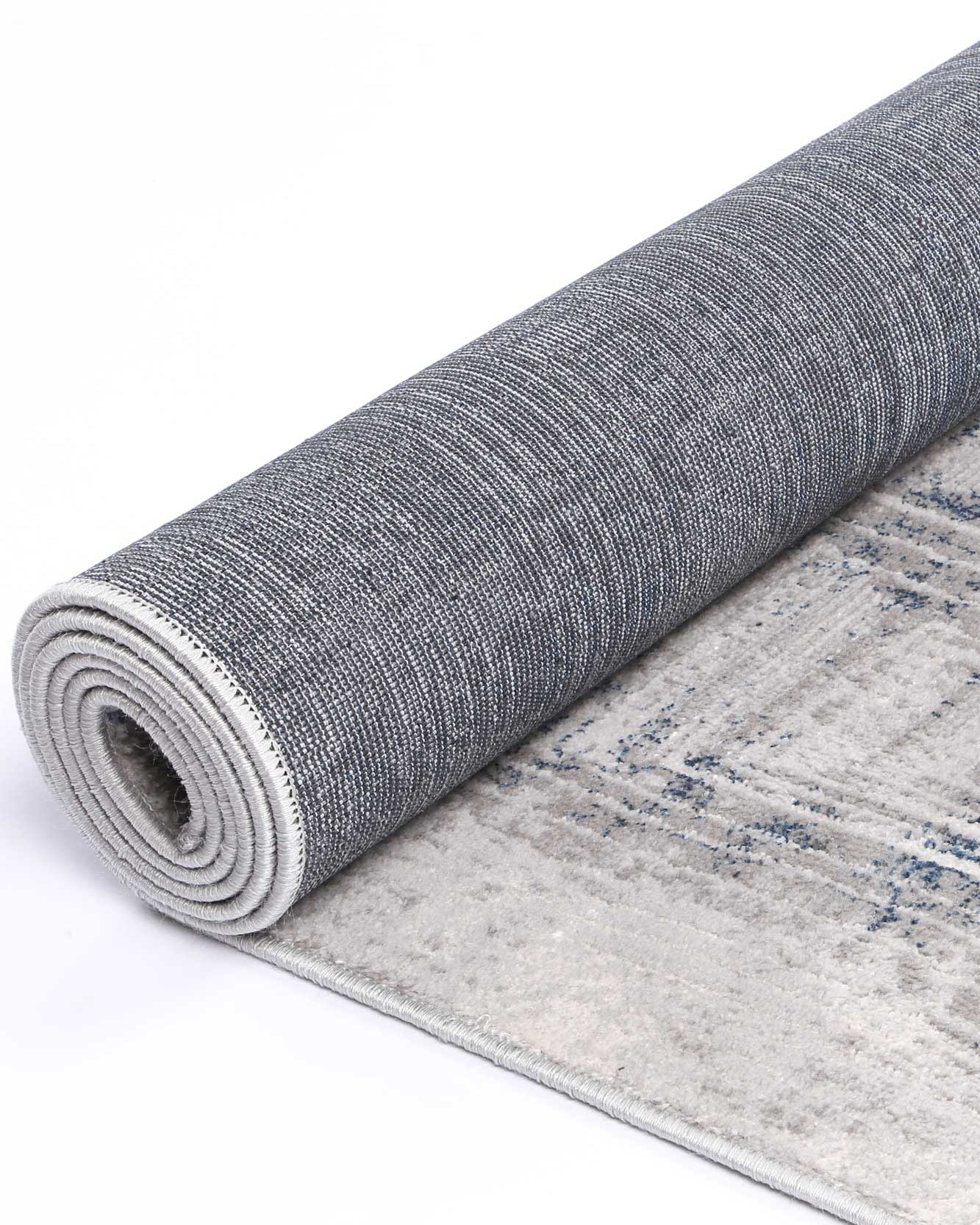Almada indigo and ash Diamond Rug rolled