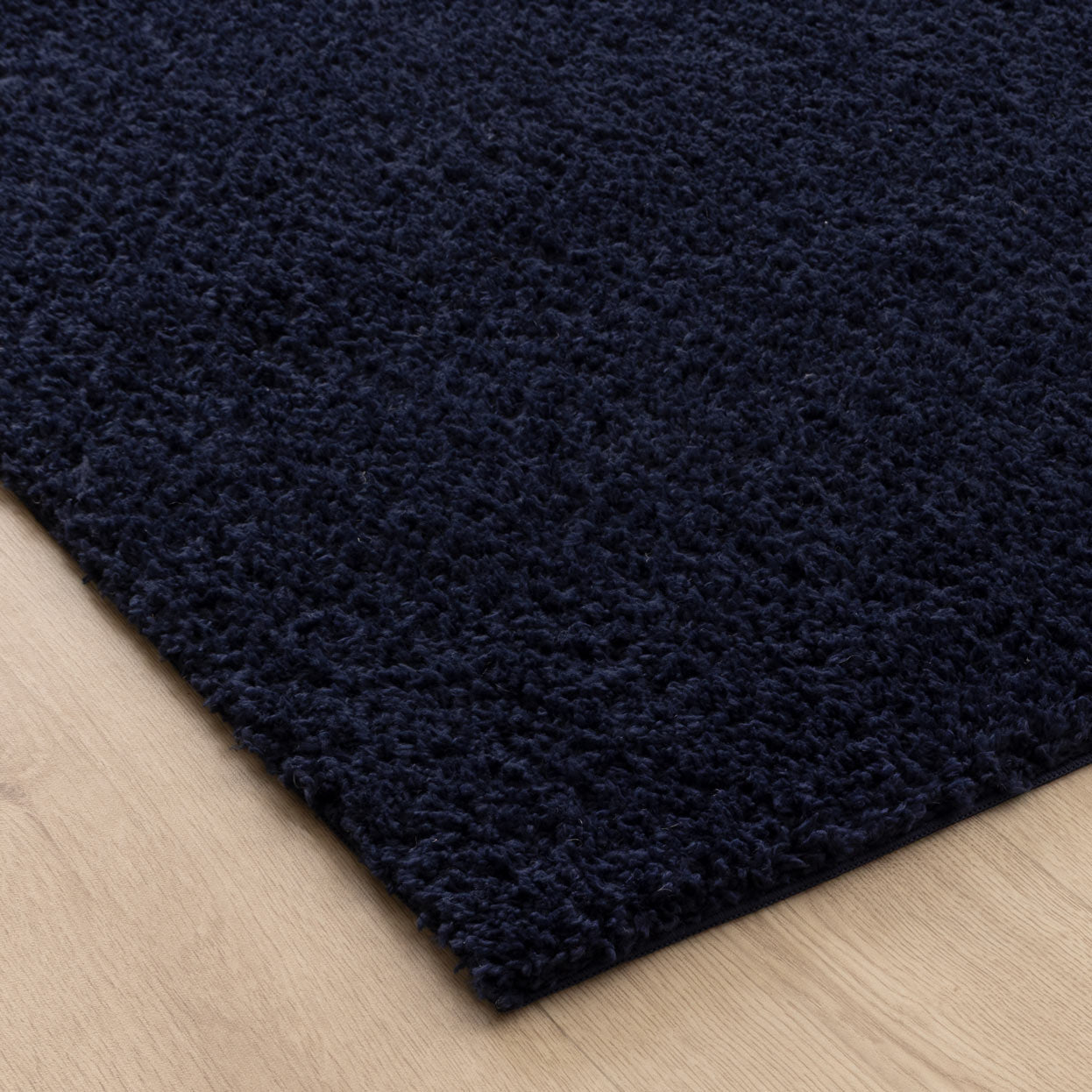 Lune Shaggy Navy Rug.